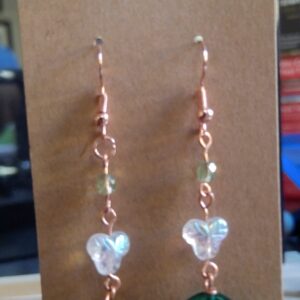 Dangle earrings with green button swirl